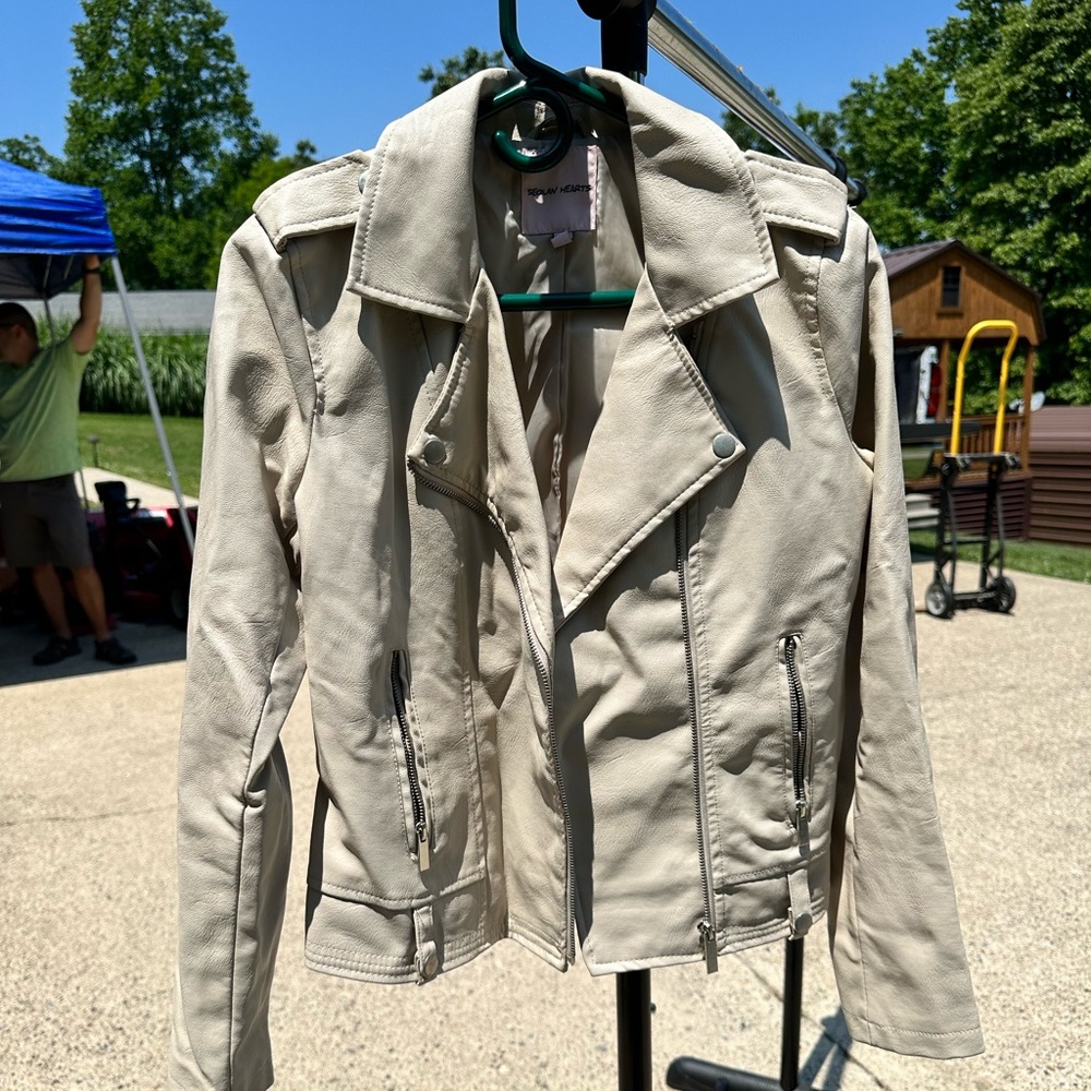 Cream leather jacket. Barley worn